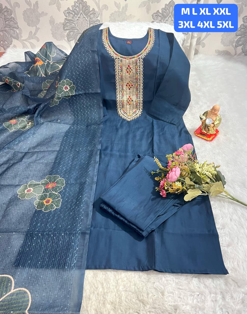 looking at a stunning Kurti Pent Dupatta Set