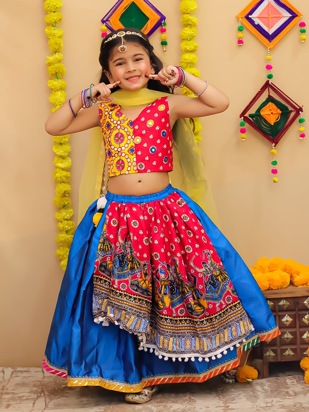 eEmbroidered double print top with one side high low &nbsp;tapeta silk lehenga and net dupatta