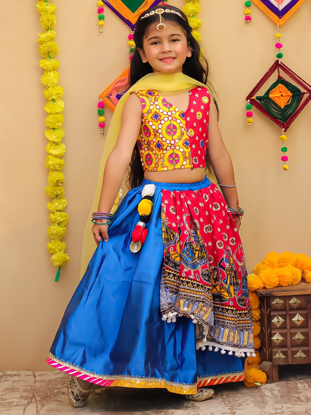 eEmbroidered double print top with one side high low &nbsp;tapeta silk lehenga and net dupatta